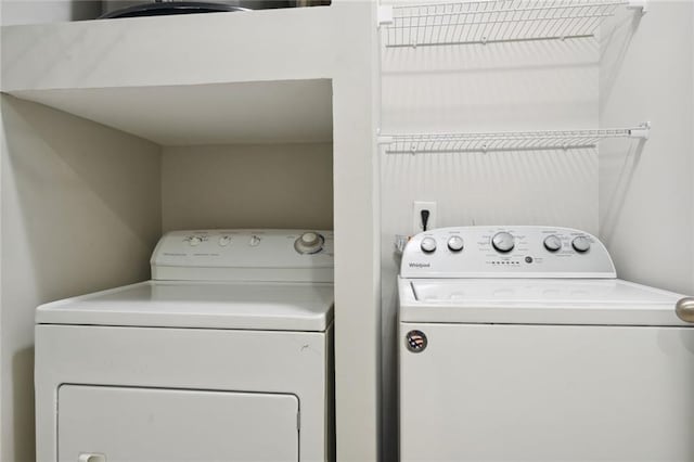 laundry room featuring independent washer and dryer