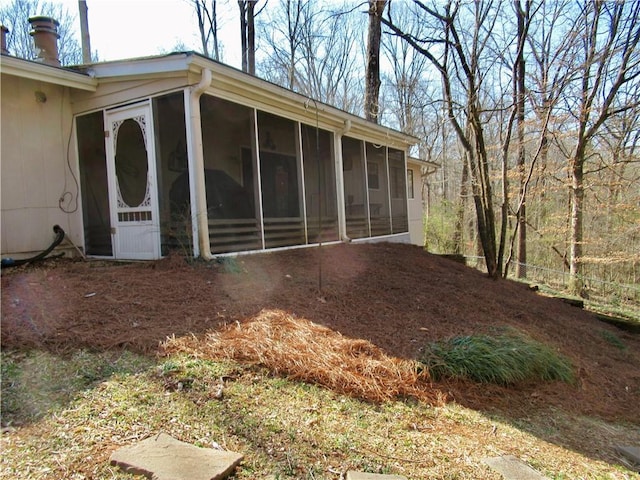 exterior space with a sunroom