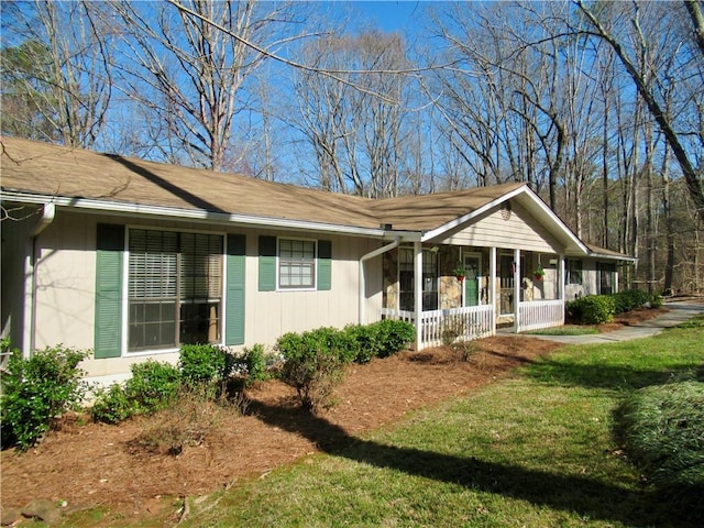 view of property exterior with a yard