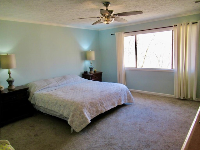 bedroom featuring carpet, a textured ceiling, baseboards, and crown molding