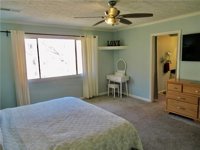 bedroom featuring visible vents, crown molding, a textured ceiling, and carpet flooring