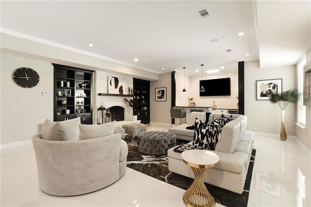 living room featuring baseboards, a fireplace, visible vents, and recessed lighting