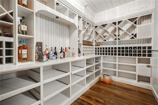 wine cellar featuring wood finished floors