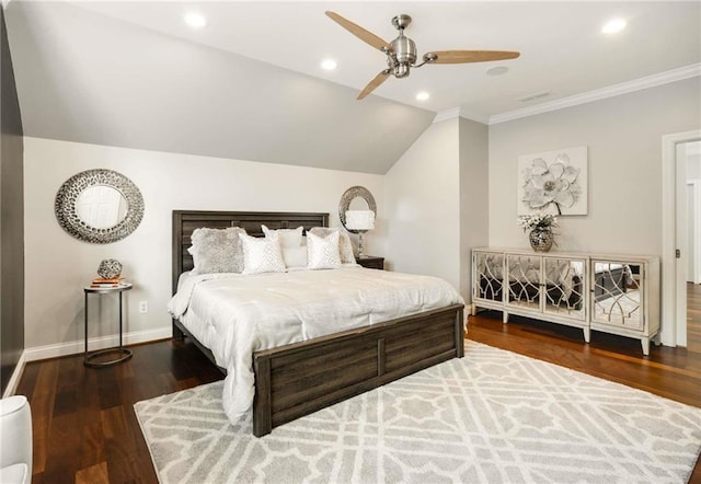 bedroom with vaulted ceiling, recessed lighting, wood finished floors, and baseboards