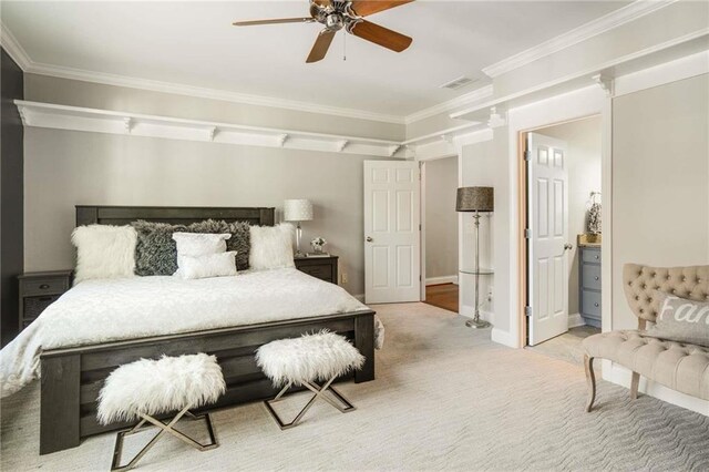 bathroom with ornamental molding, shower / bath combo with shower curtain, tile patterned flooring, and vanity