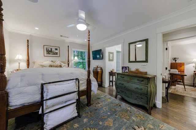 bedroom featuring crown molding, ceiling fan, and dark hardwood / wood-style flooring