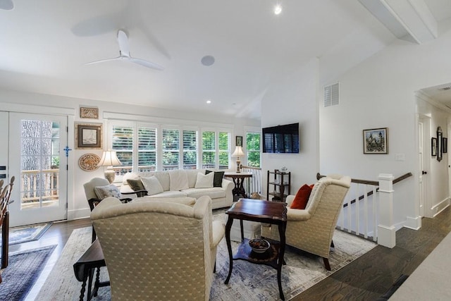 living room with ceiling fan, lofted ceiling with beams, and hardwood / wood-style flooring