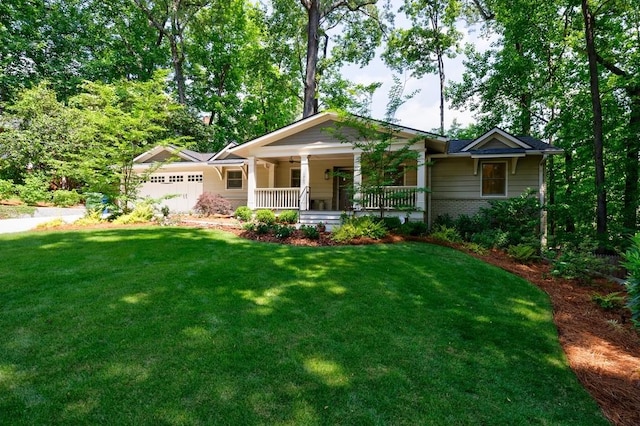 view of front of home featuring a front yard and covered porch