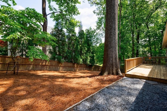 view of yard with a deck