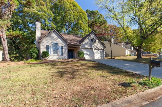 view of front facade featuring a front lawn and a garage