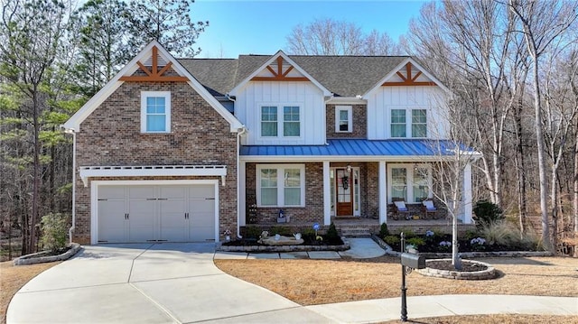 view of front of property with a garage and a porch