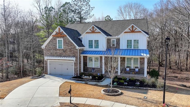 view of front of house featuring a porch and a garage