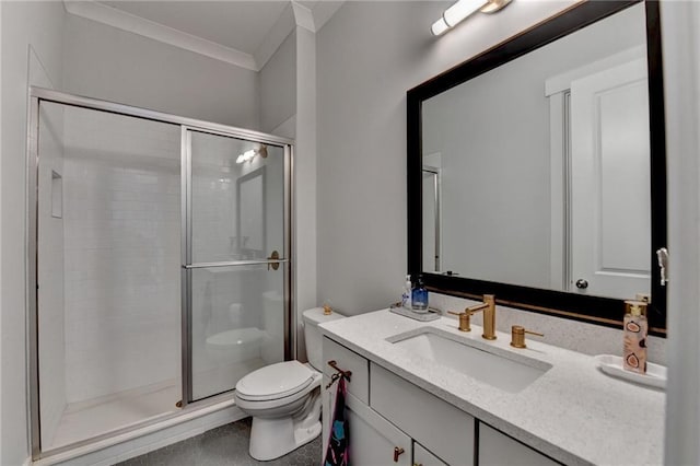 bathroom with a shower with door, ornamental molding, vanity, and toilet