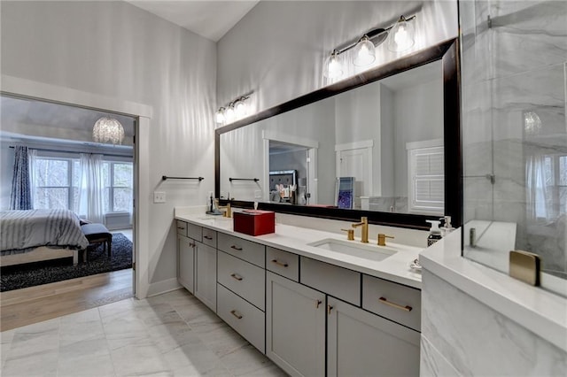 bathroom with vanity and a high ceiling