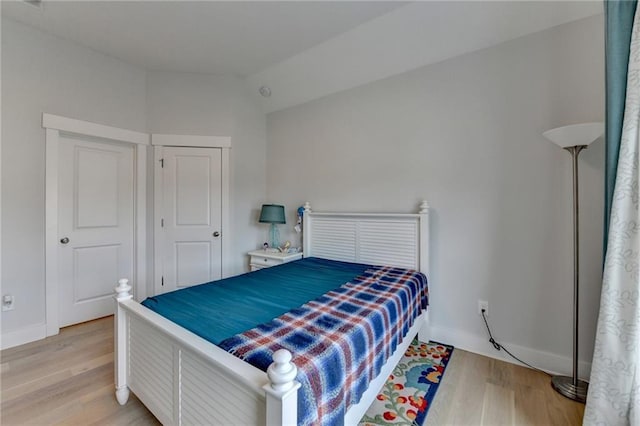 bedroom with light wood-type flooring