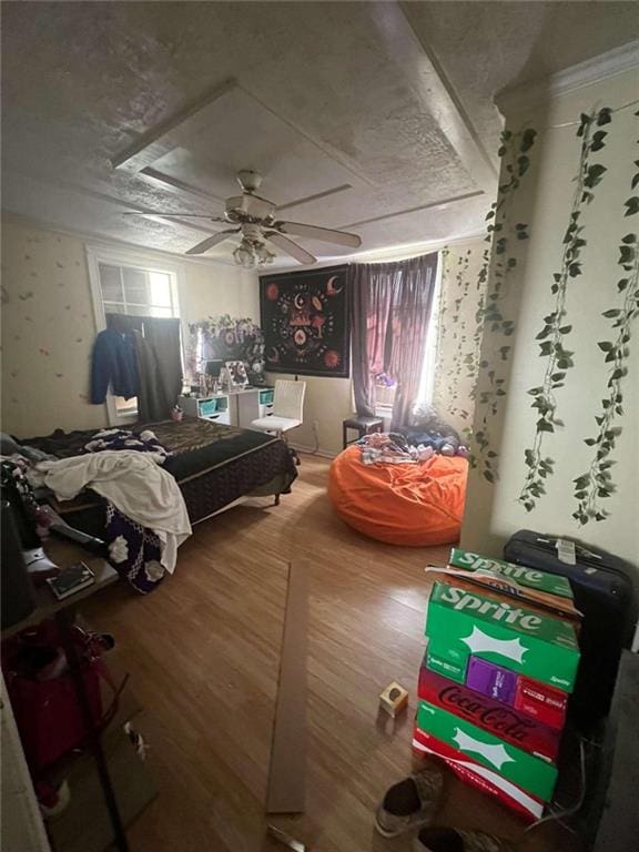 bedroom featuring hardwood / wood-style floors and ceiling fan