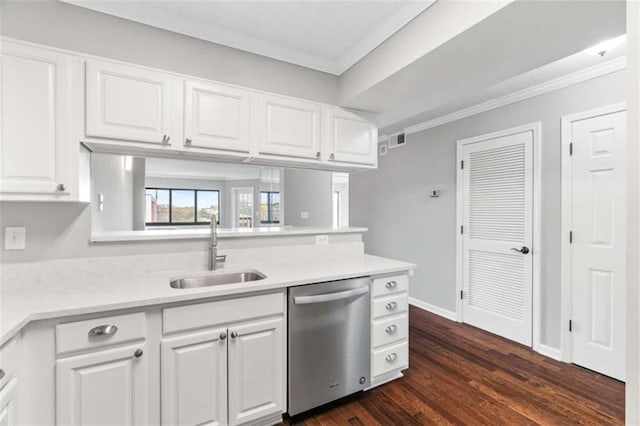 kitchen featuring a sink, white cabinets, light countertops, dishwasher, and crown molding