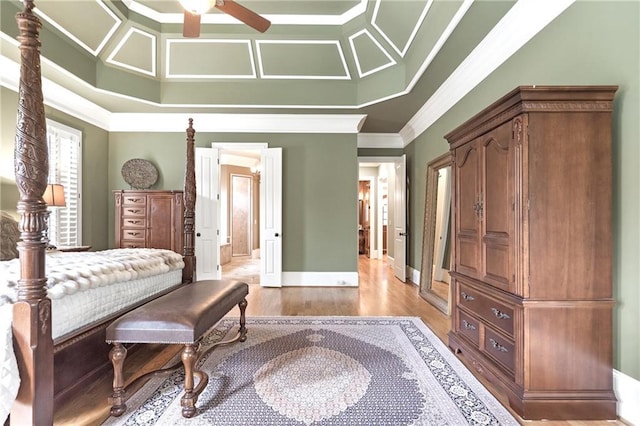 13037 Overlook Pass, Roswell, GA 30075 - bedroom with crown molding, light wood-style floors, coffered ceiling, and connected bathroom