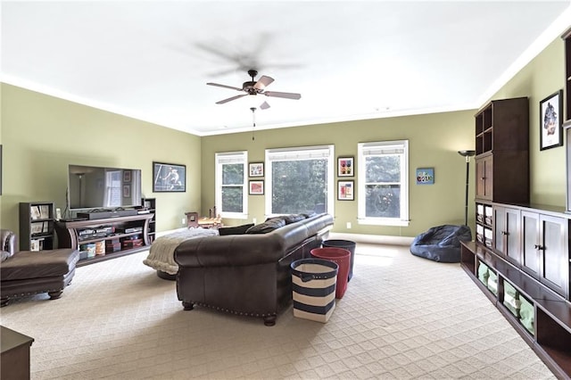 13037 Overlook Pass, Roswell, GA 30075 - living area featuring healthy amount of natural light, carpet floors, a ceiling fan, and ornamental molding