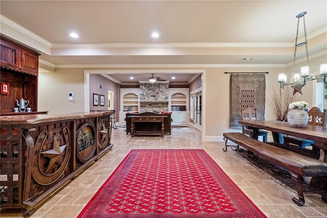 13037 Overlook Pass, Roswell, GA 30075 - living area featuring ceiling fan, stone tile floors, a stone fireplace, ornamental molding, and a chandelier