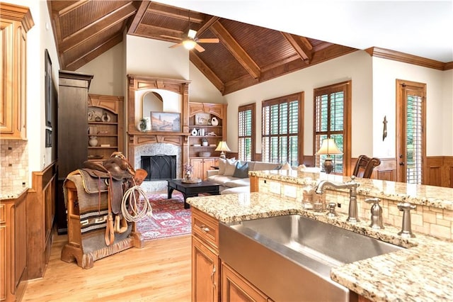 13037 Overlook Pass, Roswell, GA 30075 - kitchen with light wood-style floors, a premium fireplace, ceiling fan, wooden ceiling, and light stone countertops