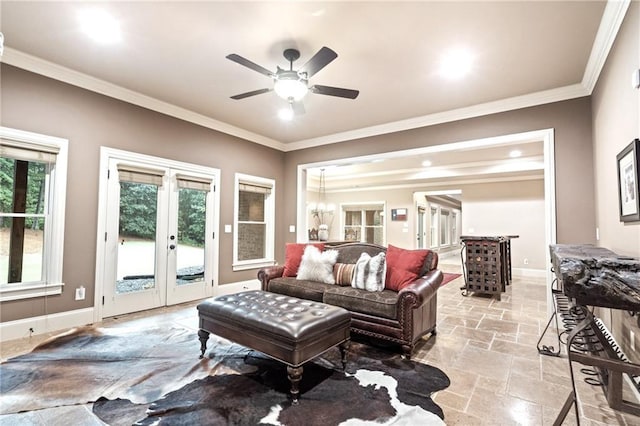 13037 Overlook Pass, Roswell, GA 30075 - living area featuring french doors, ornamental molding, stone tile floors, and ceiling fan