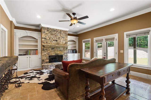 13037 Overlook Pass, Roswell, GA 30075 - living room featuring crown molding, stone tile floors, built in features, plenty of natural light, and a ceiling fan