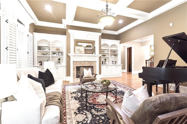 13037 Overlook Pass, Roswell, GA 30075 - living area with coffered ceiling, crown molding, a high end fireplace, light wood-type flooring, and beam ceiling