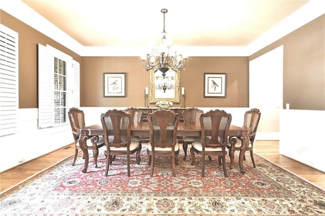 13037 Overlook Pass, Roswell, GA 30075 - dining area with a chandelier and wood finished floors