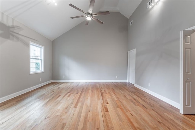 unfurnished room featuring visible vents, baseboards, and light wood-style floors