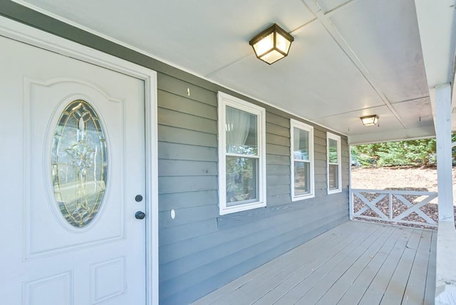 entrance to property with a porch