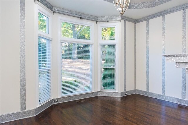 3258 Bransley Way, Duluth, GA 30097 - spare room with wood finished floors and a chandelier