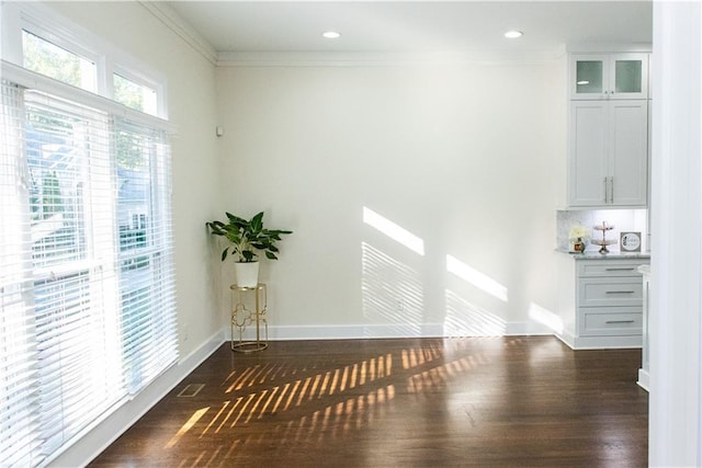 3258 Bransley Way, Duluth, GA 30097 - spare room featuring dark wood-style floors, ornamental molding, and recessed lighting