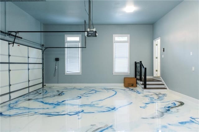 3258 Bransley Way, Duluth, GA 30097 - garage featuring a garage door opener and baseboards