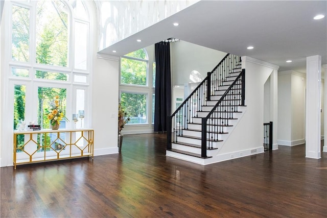 3258 Bransley Way, Duluth, GA 30097 - foyer entrance with a high ceiling, recessed lighting, wood finished floors, and stairs