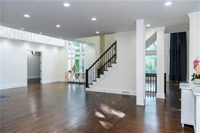 3258 Bransley Way, Duluth, GA 30097 - unfurnished living room with dark wood finished floors, recessed lighting, and stairway