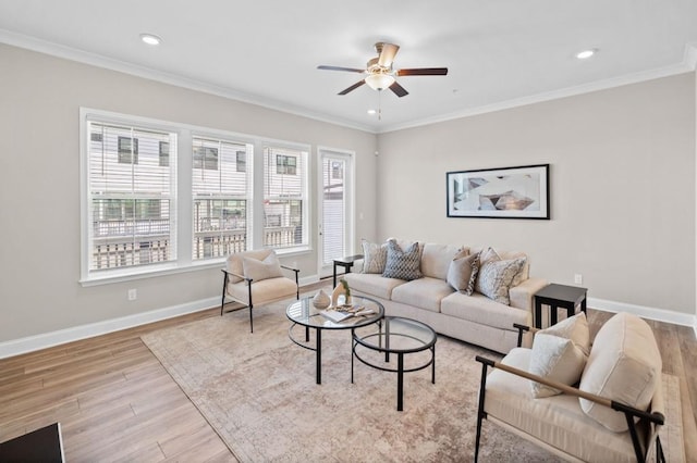 living area with a ceiling fan, wood finished floors, baseboards, ornamental molding, and recessed lighting