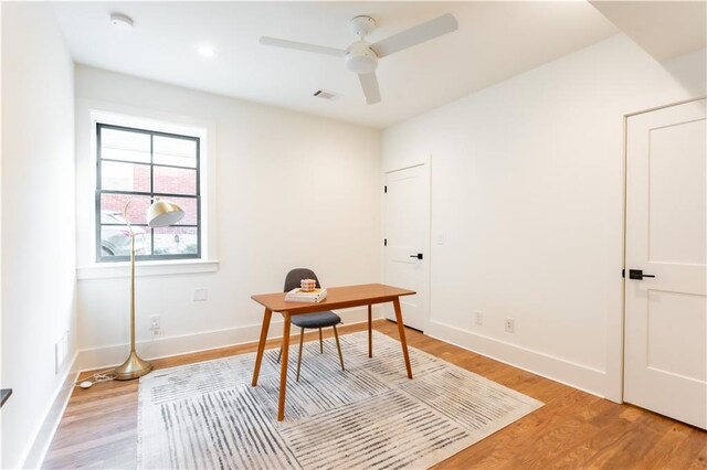 office area featuring ceiling fan and light wood-type flooring