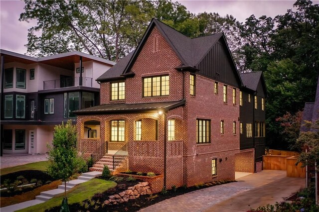 view of front of property with a balcony