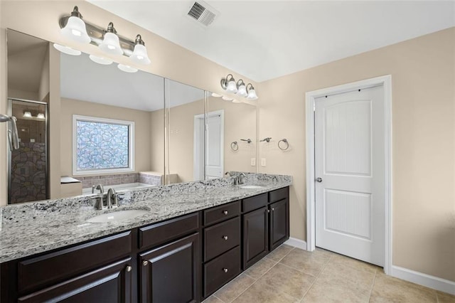 745 Newfield Ln, Alpharetta, GA 30004 - full bathroom with double vanity, a stall shower, tile patterned flooring, and a bath