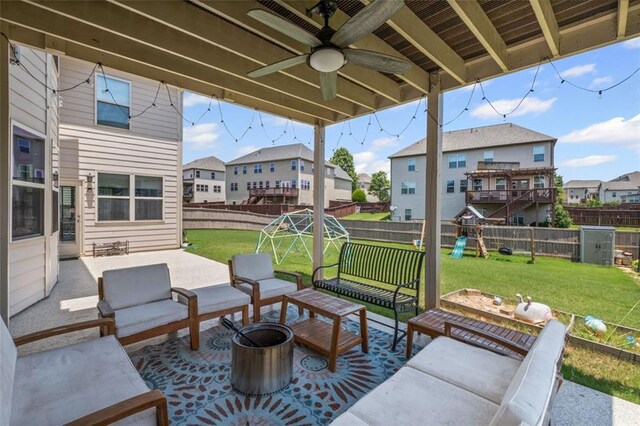 745 Newfield Ln, Alpharetta, GA 30004 - fenced backyard featuring a playground, a patio area, an outdoor living space, and a residential view