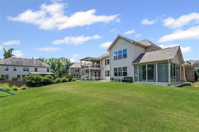 745 Newfield Ln, Alpharetta, GA 30004 - back of house featuring a sunroom and roof with shingles