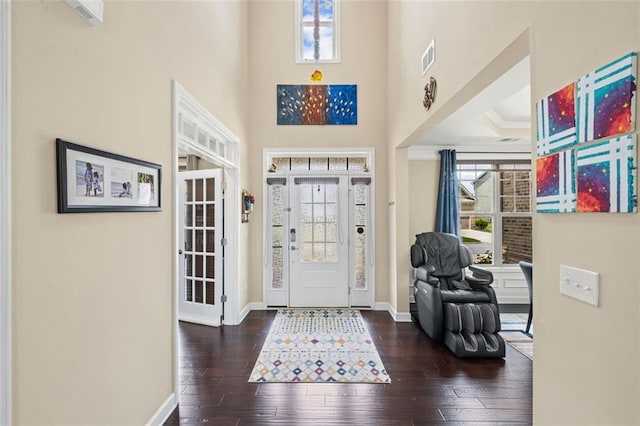 745 Newfield Ln, Alpharetta, GA 30004 - entrance foyer featuring plenty of natural light, hardwood / wood-style floors, a high ceiling, and ornamental molding