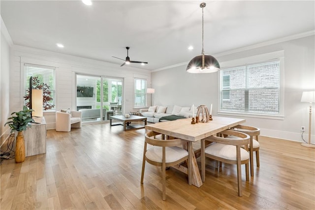 2565 Cork St, Braselton, GA 30517 - dining room featuring ornamental molding, plenty of natural light, light wood finished floors, baseboards, and recessed lighting
