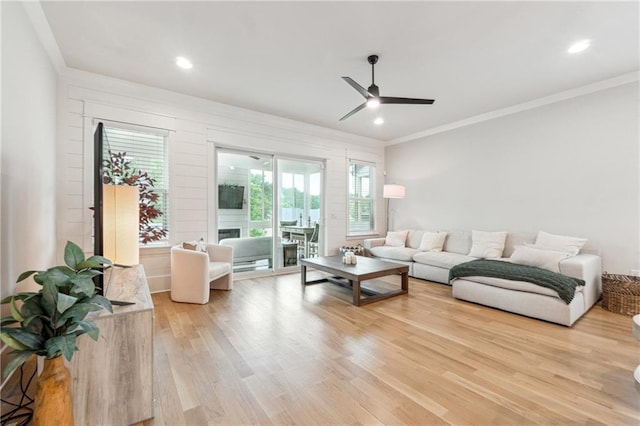 2565 Cork St, Braselton, GA 30517 - living room featuring ceiling fan, light wood finished floors, ornamental molding, a fireplace, and recessed lighting