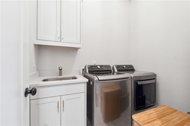 2565 Cork St, Braselton, GA 30517 - clothes washing area with independent washer and dryer and cabinet space