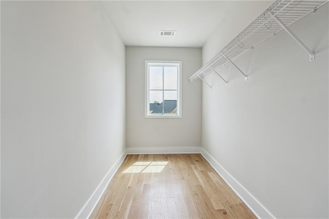 2565 Cork St, Braselton, GA 30517 - spacious closet with light wood-style floors