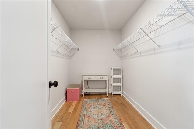 2565 Cork St, Braselton, GA 30517 - walk in closet featuring wood finished floors