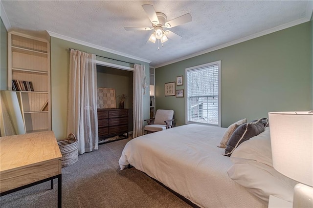 bedroom with crown molding, carpet flooring, ceiling fan, and a textured ceiling