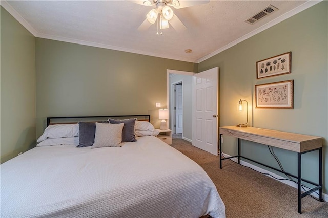 bedroom with crown molding, ceiling fan, and carpet